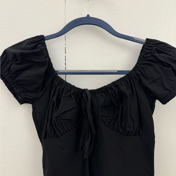 Black mini dress with puffy sleeves. Never worn. - Picture 2 of 3